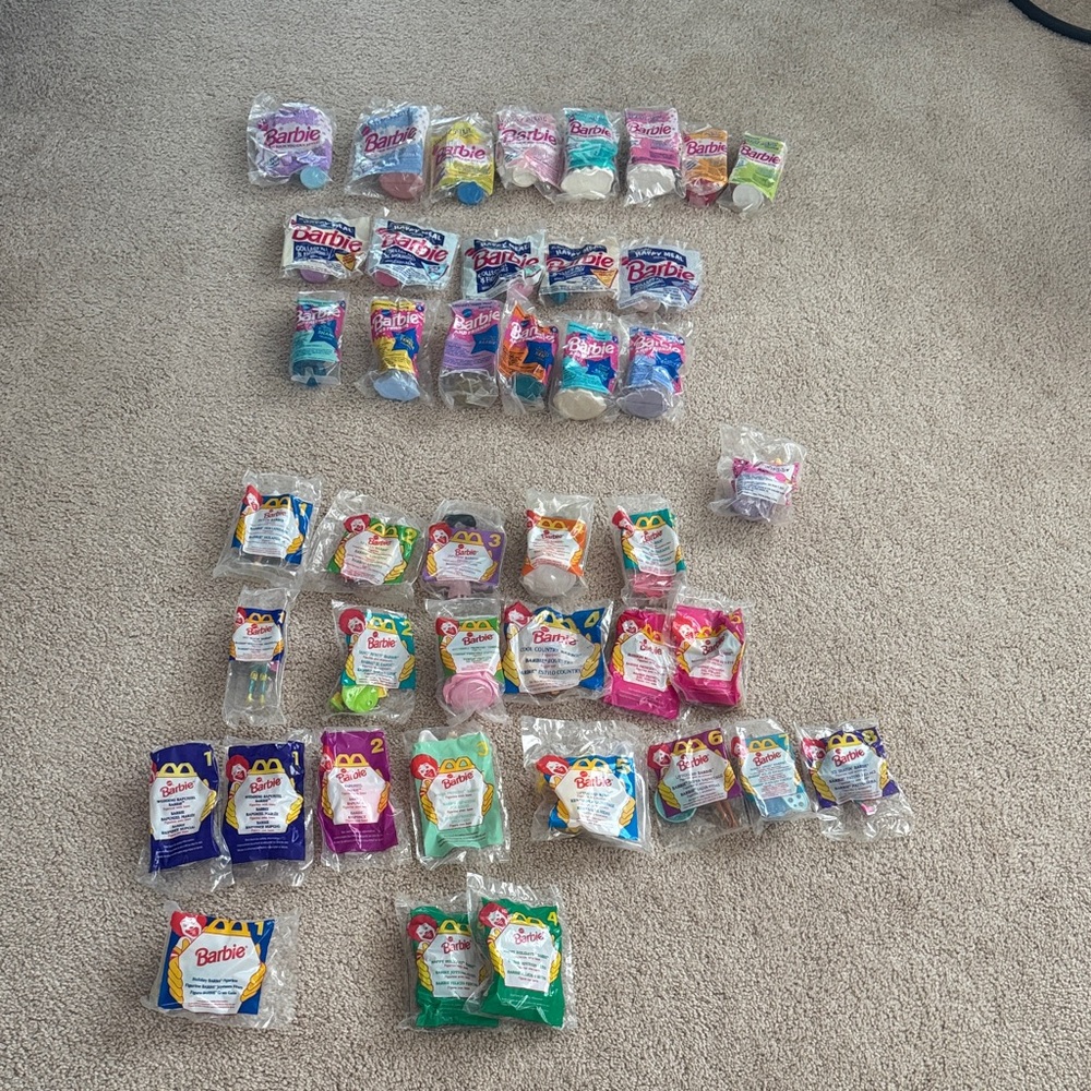 Massive Lot of 42 McDonald’s Barbie Happy Meal Toys – All New in Package